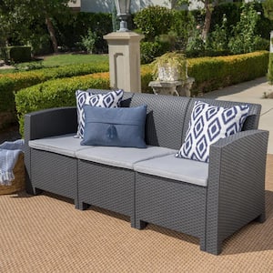 Gray Wicker Outdoor Couch with Light Gray Water Resistant Cushions