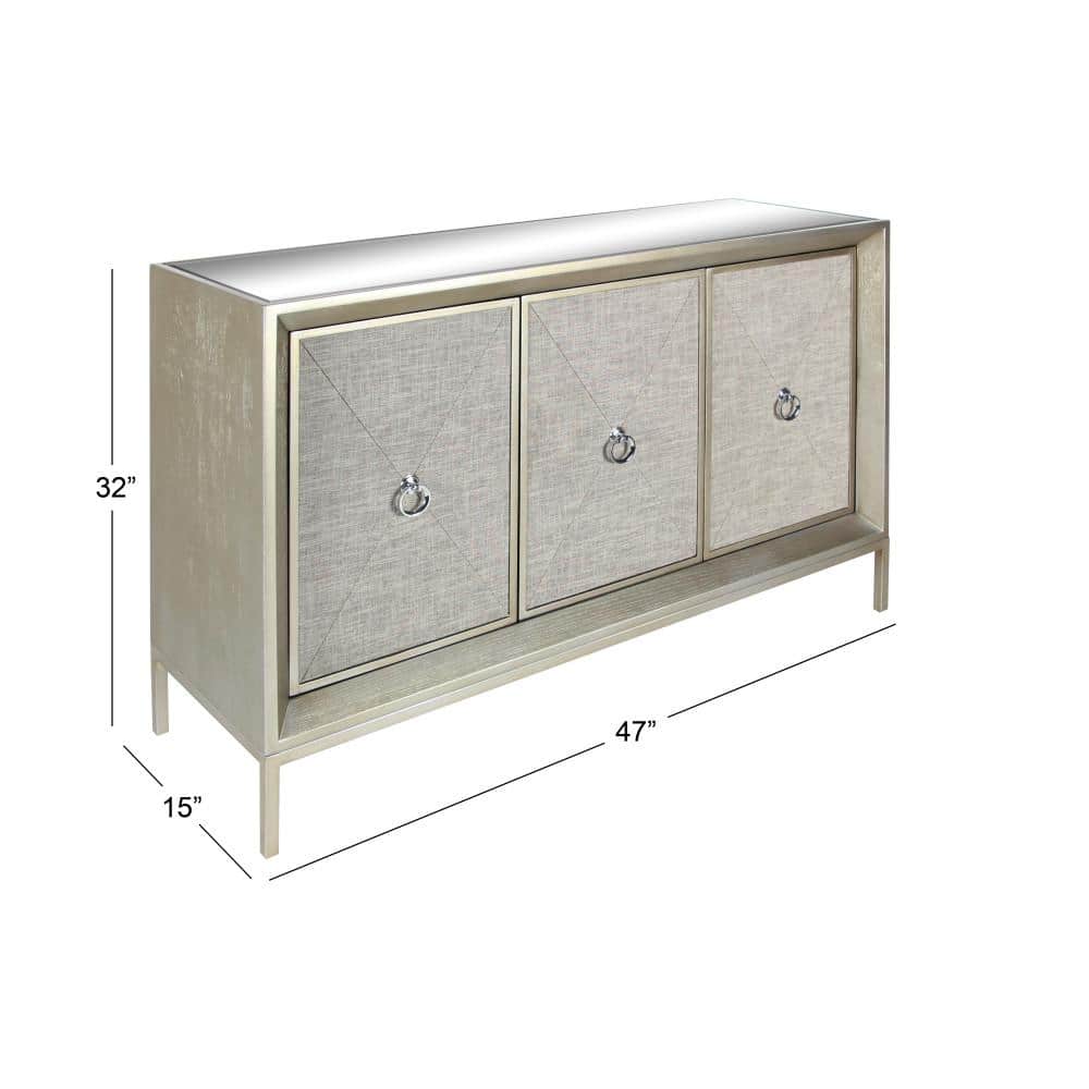 Gray Upholstered 3-Door Cabinet with Mirrored Top and Ring Handles