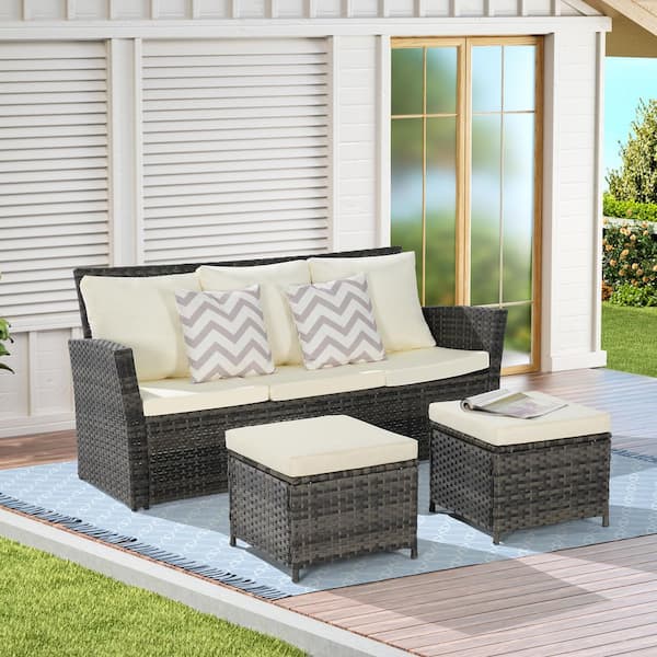 Noble House Derek 3-Piece Outdoor PE Rattan and Metal Patio Conversation Set with Beige Cushions and Two Ottomans