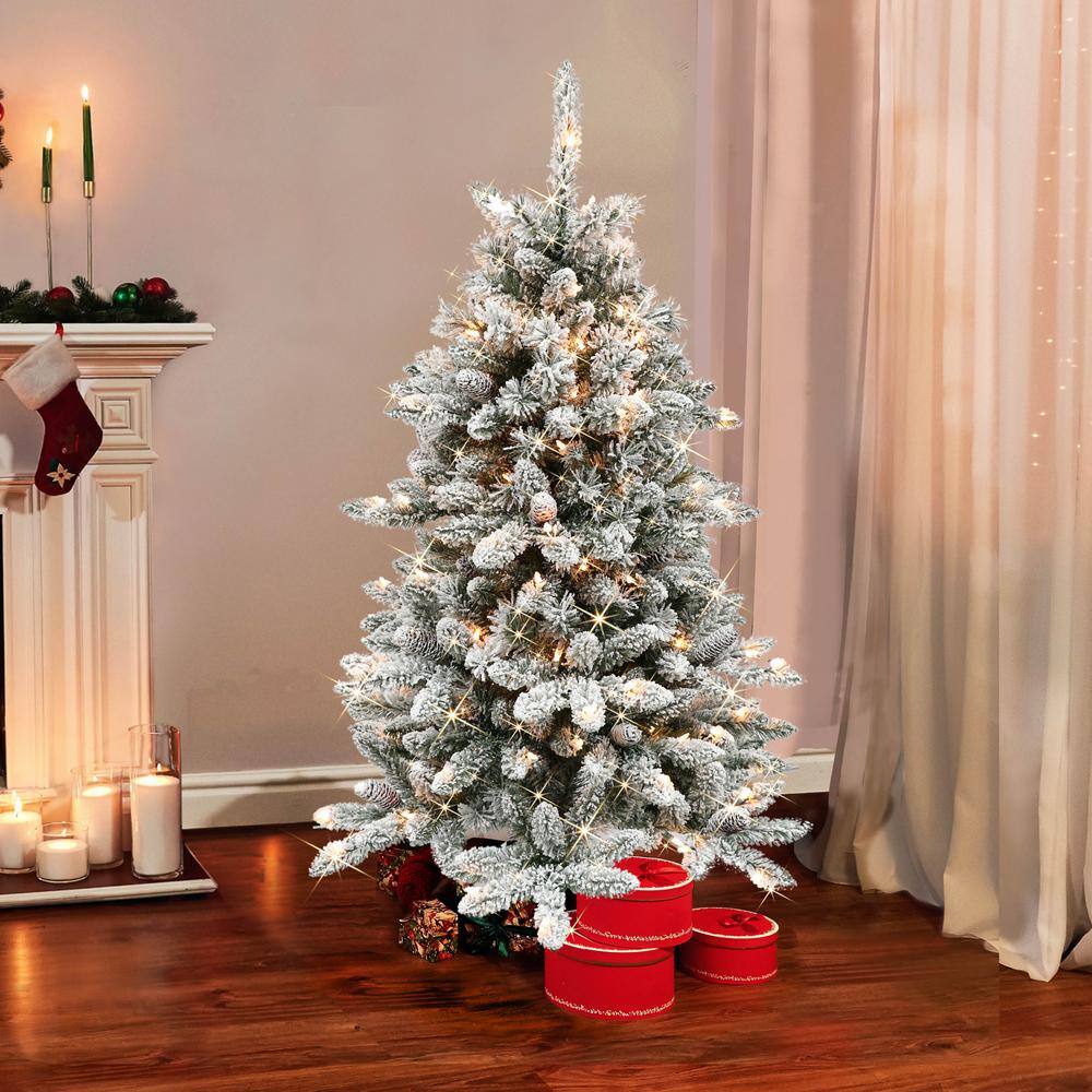 Winter Whisper 4.5' Pre-Lit Flocked Fir Artificial Christmas Tree with Warm White Lights