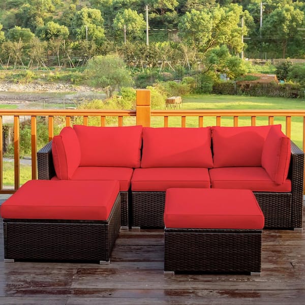 patio set with red cushions