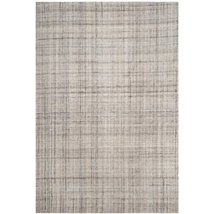 Abstract Camel/Black 6 ft. x 9 ft. Solid Area Rug