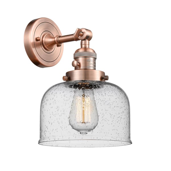 Innovations Bell 1-Light Seedy, Antique Copper Wall Sconce with Clear Glass Shade