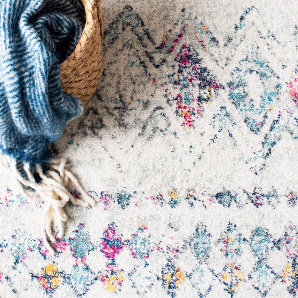 Ivory and Multicolor Geometric Wool and Synthetic 10' x 14' Area Rug