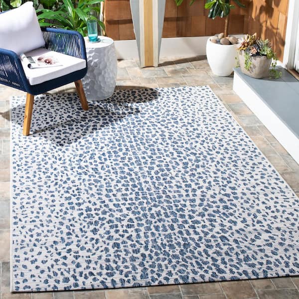 Courtyard Ivory/Navy Doormat 2 ft. x 4 ft. Cheetah Geometric Indoor/Outdoor Area Rug
