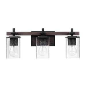 Dakota 20 in. 3-Light Matte Black Vanity Light with Dark Faux Wood Accents and Clear Seeded Glass Shade