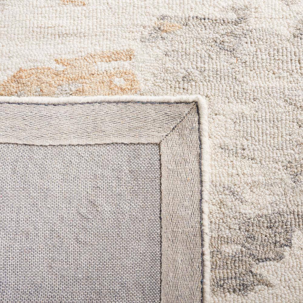 Ivory and Gray Abstract Handmade Wool 4' x 6' Area Rug
