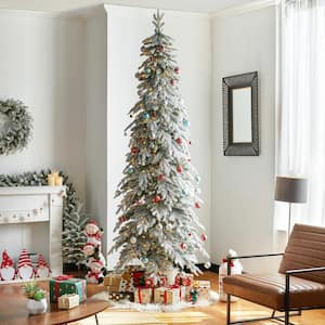 9 ft. Pre-Lit Flocked Pencil Spruce Artificial Christmas Tree with 470 Warm White Lights