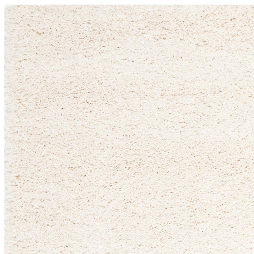 Ivory 8' x 10' Reversible Solid Shag Synthetic Rug