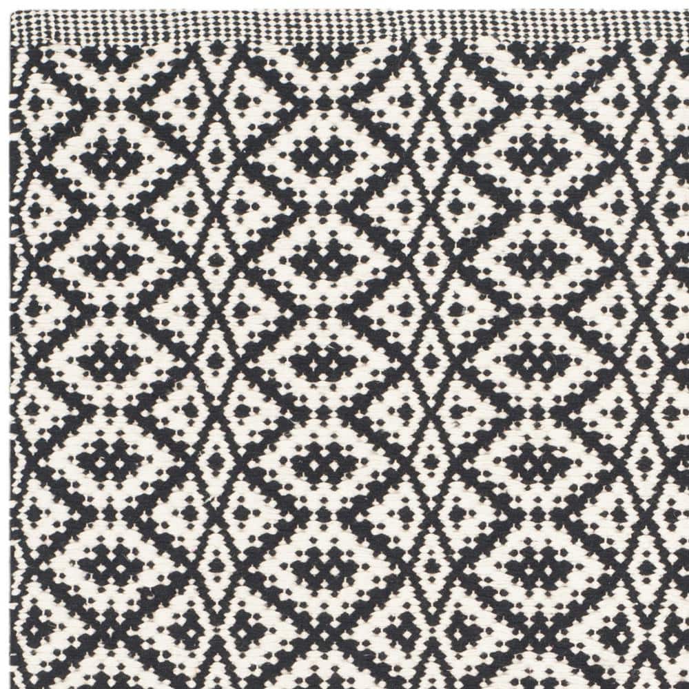 Ivory and Black Hand-Woven Cotton Wool Montauk Area Rug