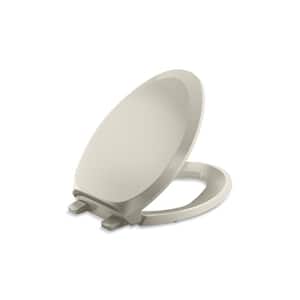 French Curve Elongated Closed Front Toilet Seat in Sandbar