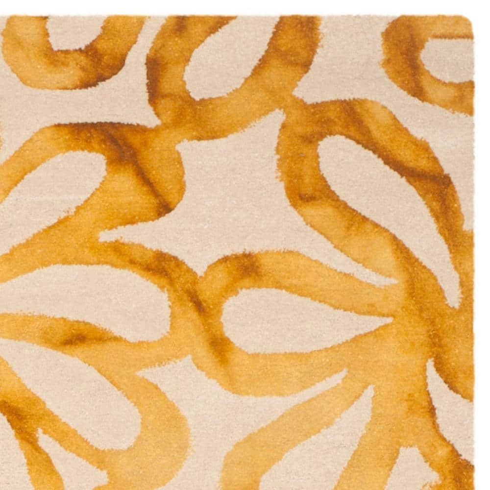 Beige and Gold 9' x 12' Handmade Wool Tufted Area Rug