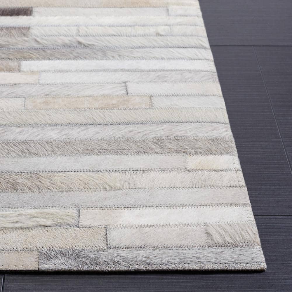 Handmade Gray and Brown Geometric Cowhide Area Rug