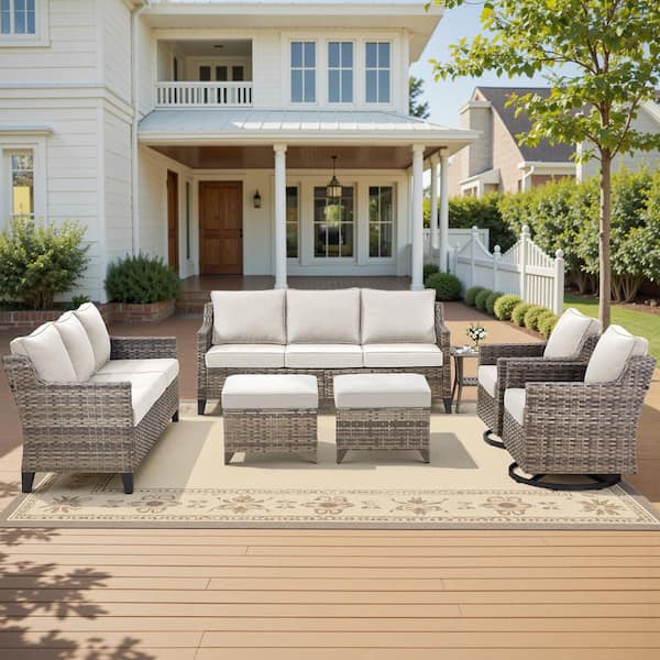 Glissia 7-Piece Gray Wicker Patio Conversation Set with Swivel Gliders and 4 in. Olefin Beige Cushions