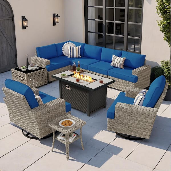 XIZZI Felicity 10 Pieces Wicker Outdoor Patio Rectangular Fire Pit Set and Swivel Rocking Chairs with Navy Blue Cushions