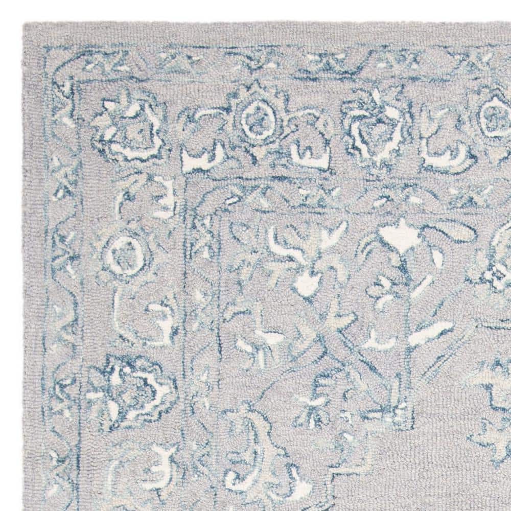 Light Grey and Ivory Wool Tufted 4' x 6' Area Rug