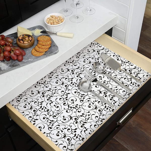 https://images.thdstatic.com/productImages/b9a1f74d-1798-426d-8f95-f297a2459a57/svn/black-and-white-con-tact-shelf-liners-drawer-liners-16f-c9ar62-06-4f_600.jpg