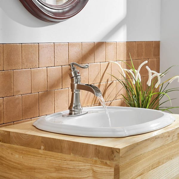 Waterfall Single Hole Single-Handle Low-Arc Bathroom Faucet With Pop-up Drain Assembly in Brushed Nickel