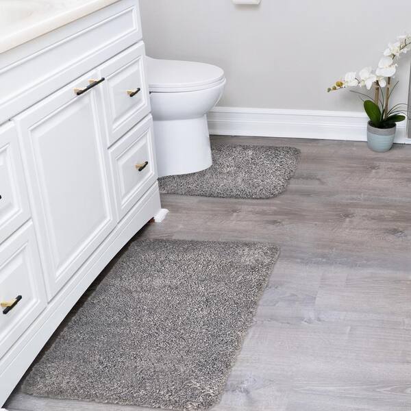 https://images.thdstatic.com/productImages/b9a996e5-bec2-43dd-b7d3-f7c006e93f2b/svn/gray-sussexhome-bathroom-rugs-bath-mats-cal-sld-gy-uset-31_600.jpg