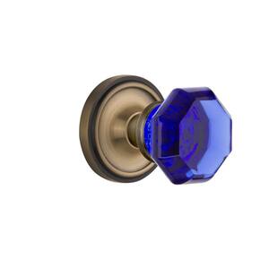 Classic Rosette 2-3/4 in. Backset Antique Brass Privacy Bed/Bath Waldorf Cobalt Door Knob