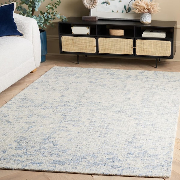 Ebony 6 ft. x 9 ft. Ivory/Blue Faded Abstract Distressed Area Rug