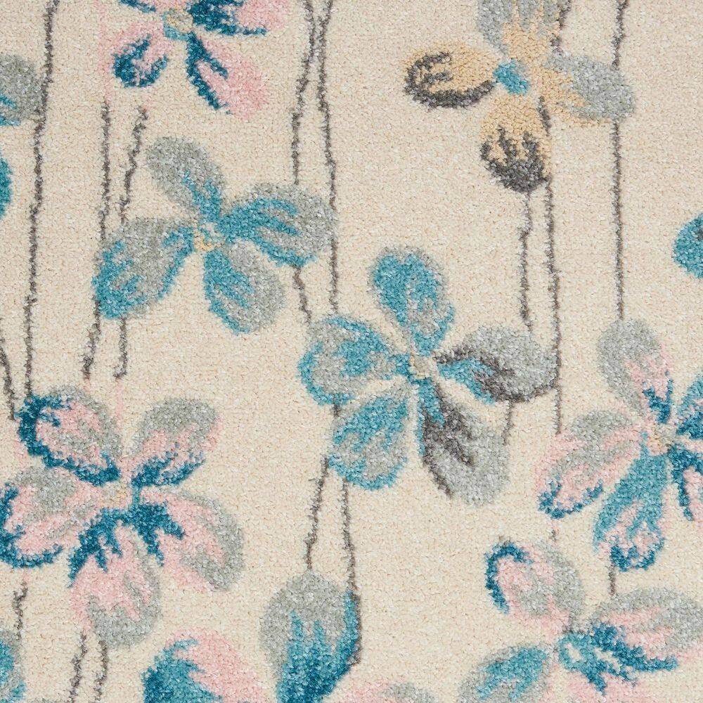 Ivory Floral Bliss Synthetic 5'3" x 7'3" Round Area Rug