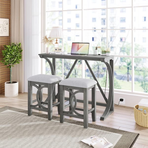 Unbranded Gray 3-Piece Wood Rectagular Table Counter Height Outdoor Dining Set with USB Port, 2 Stools and White Cushions