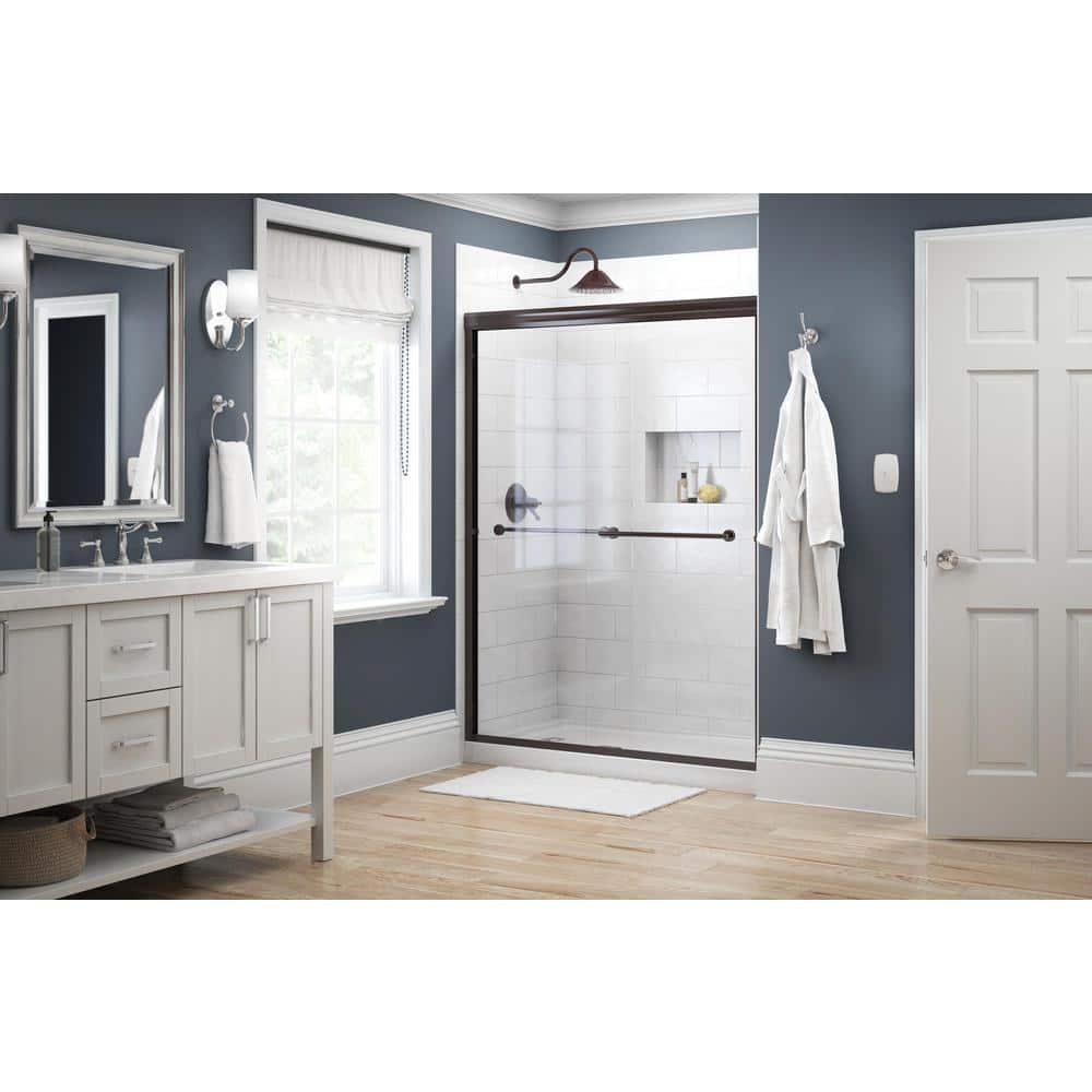 Traditional 59-3/8 in. W x 70 in. H Semi-Frameless Sliding Shower Door in Bronze with 1/4 in. Tempered Clear Glass -  Delta, 158867