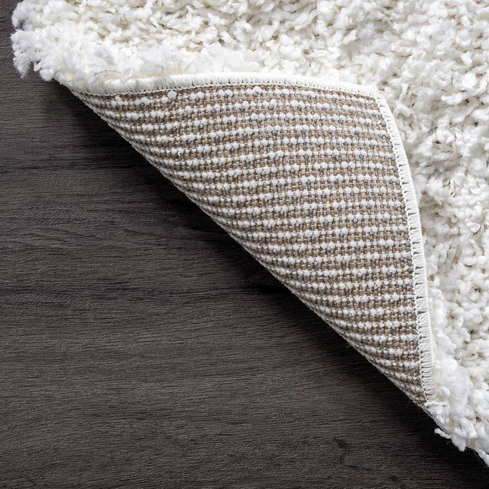 Cozy White Synthetic 8' x 10' Handmade Tufted Shag Rug