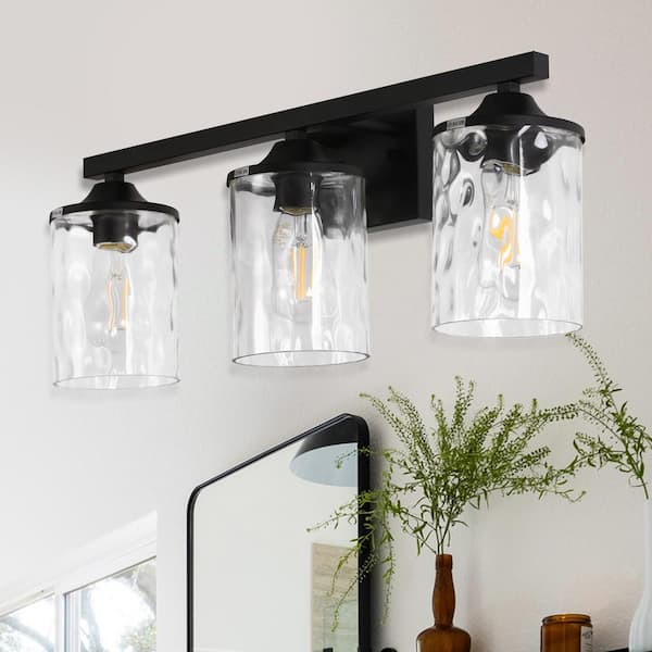 23 in. 3-Light Matte Black Modern Bathroom Vanity Light with Clear Hammered Glass Shades, Wall Mount Fixture