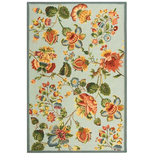 SAFAVIEH Chelsea Light Blue 6 ft. x 9 ft. Floral Gradient Solid Area Rug
