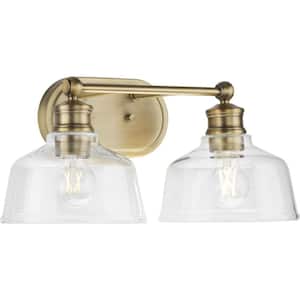 Singleton 17 in. 2-Light Vintage Brass Vanity Light with Clear Glass Shades