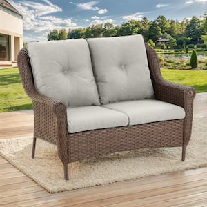 Brown PE Wicker Outdoor Loveseat with Beige Cushions and Chrysanthemum Armrest