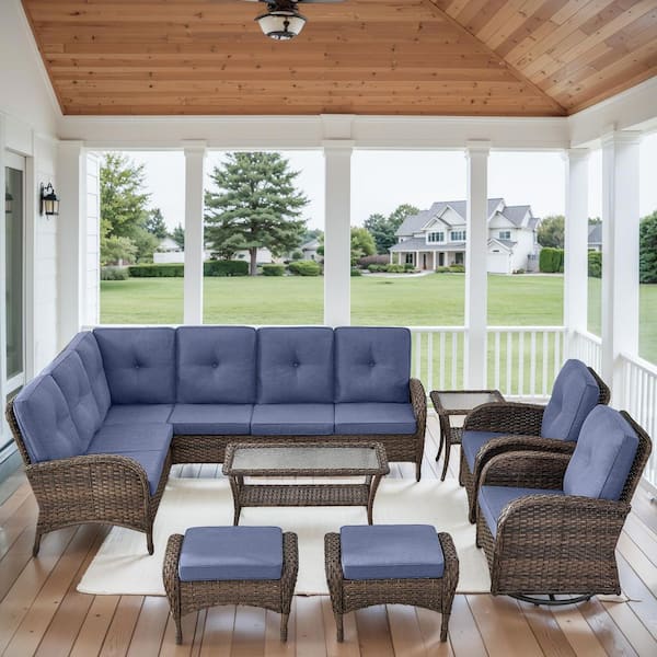 Carlos 8-Piece Brown Wicker Patio Conversation Set with Blue Cushions Swivel Chairs, Coffee Table and Ottomans