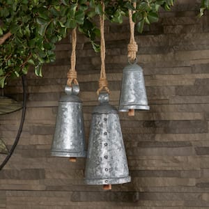 Litton Lane Silver Metal Tibetan Inspired Narrow Cone Decorative Cow Bell with Jute Hanging Rope and Rod