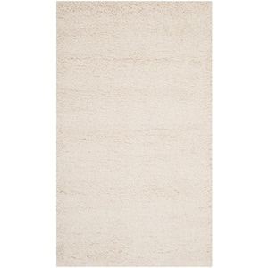 Milan Shag Ivory 3 ft. x 5 ft. Solid Area Rug
