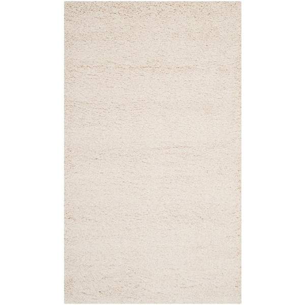 Milan Shag Ivory 4 ft. x 6 ft. Solid Flokati Area Rug