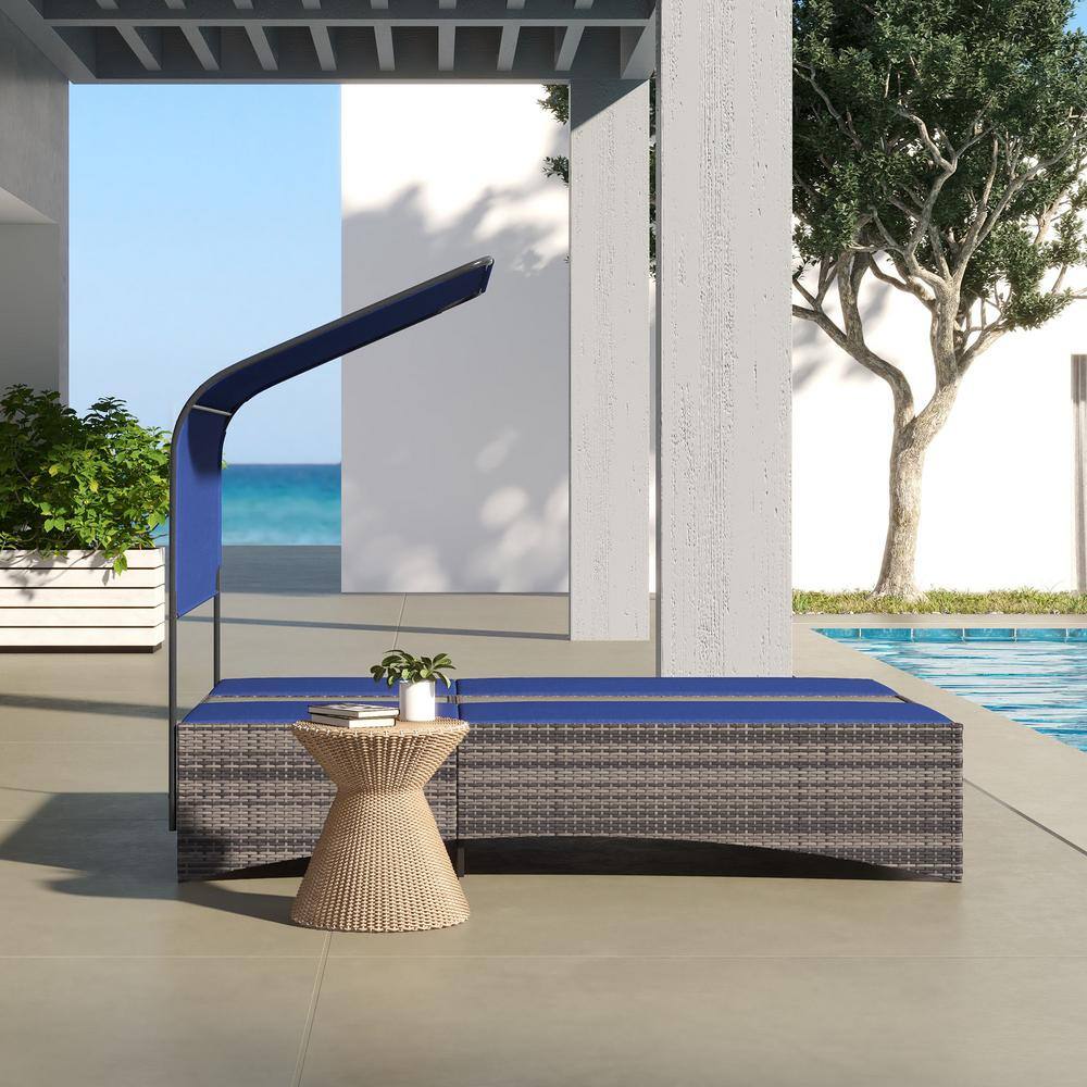 Gray Steel Double Chaise Lounge with Blue Cushions and Canopy