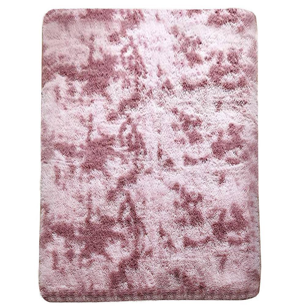 GHOUSE Contemporary Shag Pink Purple 7 ft. x 10 ft. Solid Area Rug Latepis cozy shag area rug is ideal for traditional and contemporary rooms as it dampens noise and warms up cold bare floors. Close your eyes and lie on your fuzzy carpet, 1.5 in. high nectarine velvet pile gives a super soft feeling to the touch, which caused you to feel a little thin and lightweight. Middle high density sponge layer of the throw rug adds extra cushion under your body, soothe tired muscles. It's like lying on a cloud, bring you to fall into wonderful dreams easily. Color: Pink Purple.