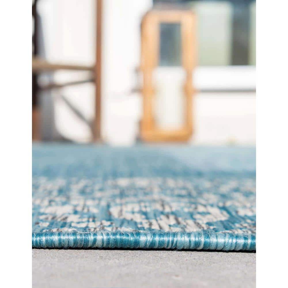 Aqua Floral Bliss Easy-Care Synthetic Outdoor Rug 7'1" x 10'