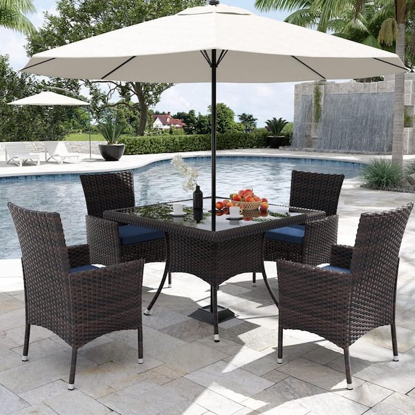 10-Piece Wicker Patio Outdoor Dining Set with Glass Tabletop, 1.5 in. Umbrella Hole and Navy Blue Cushion