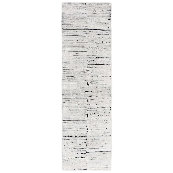 Kenya 2 ft. x 9 ft. Ivory/Black Distressed Abstract Runner Rug