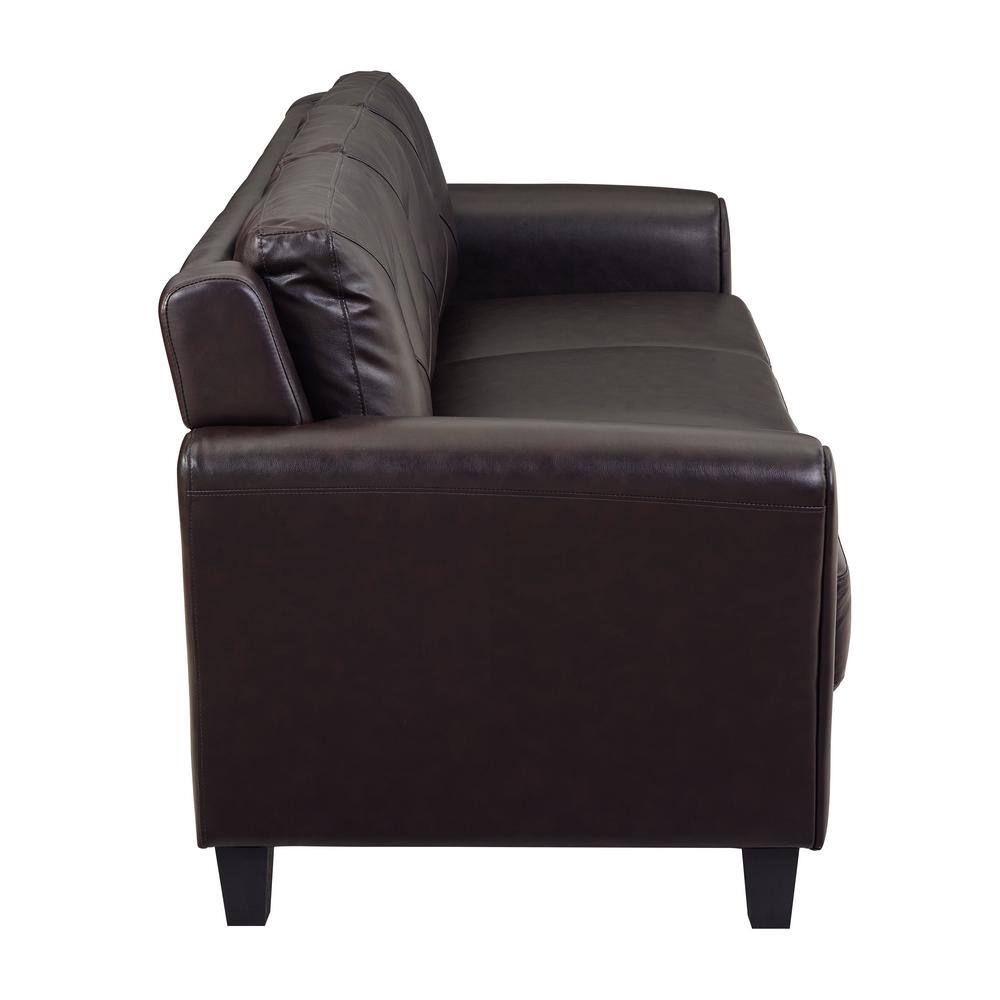 Close-up detail of the rolled arm and tufting on a brown sofa.