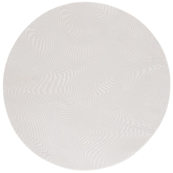 Revive 7 ft. x 7 ft. Ivory Solid Abstract Wavy Round Area Rug