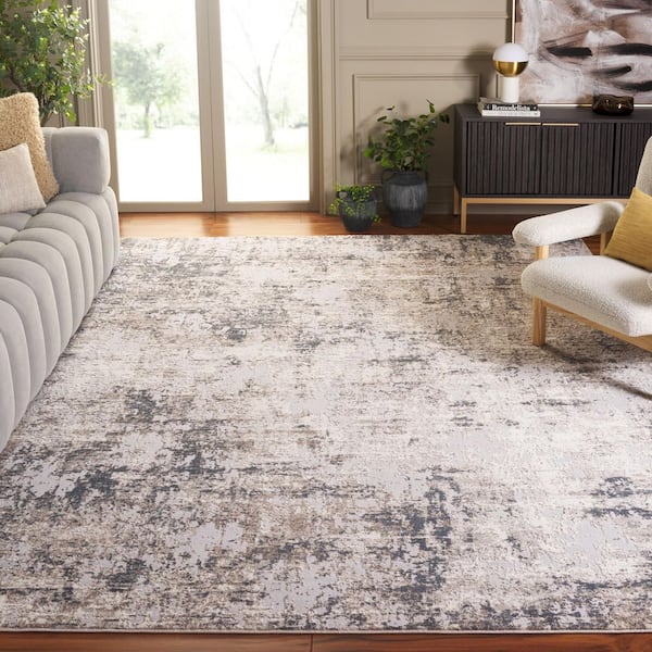 Continental Costco 9 ft. x 12 ft. Ivory/Slate Abstract Area Rug