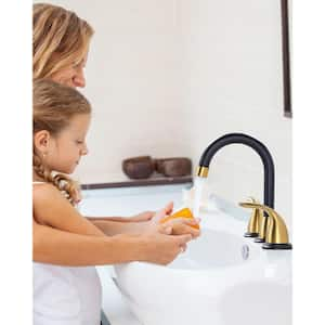 8 in. Widespread Double Handle Bathroom Faucet with Drain Kit Included in Gold and Black