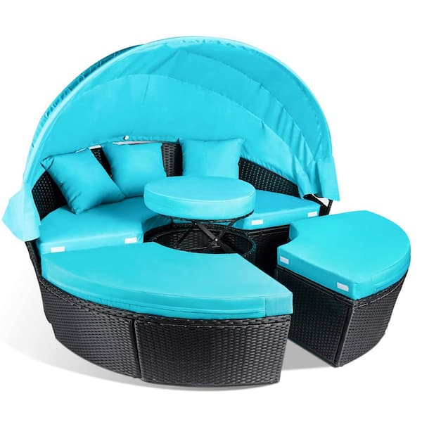 Unbranded Black Wicker Outdoor Day Bed with Blue Cushions Retractable Canopy and Separate Seating Round Sectional Sofa Set