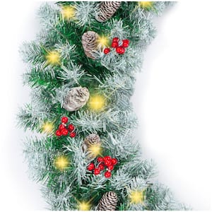 9 ft. Battery Operated Pre-Lit Incandescent Artificial Christmas Garland with Flocking, Pine Cones, Berries