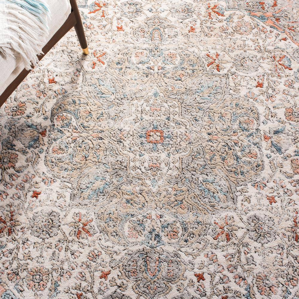 Ivory and Grey Medallion Synthetic 4' x 6' Area Rug