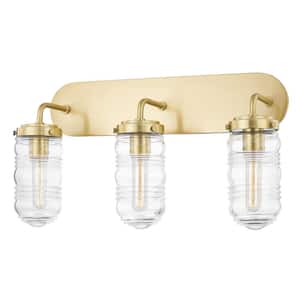 Clara 24 in. 3-Light Aged Brass Vanity Light with Clear Ribbed Glass Shade